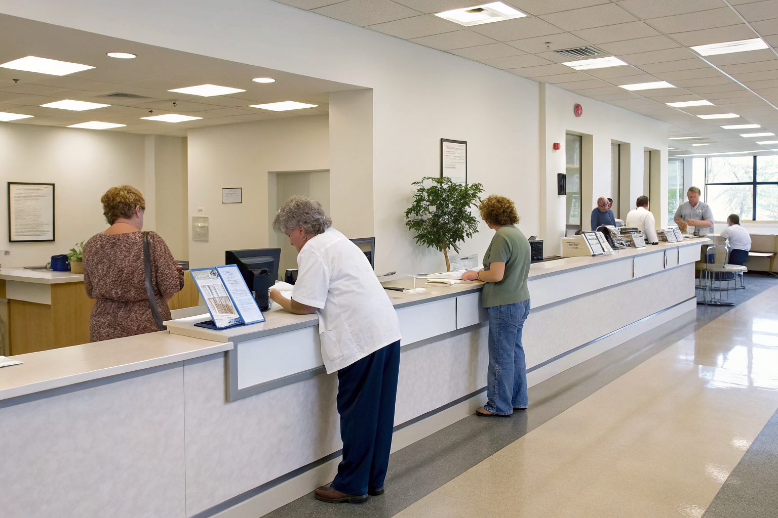Ohio health district office with permit forms and staff assisting visitors.